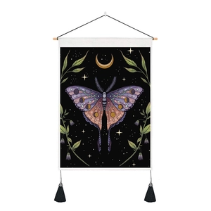 Nordic wall tapestry with mystical moth design and lunar phases on a wooden hanging pole