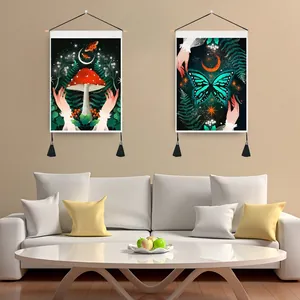 Detail of butterfly and mushroom wall hangings with black tassels in a bright living room
