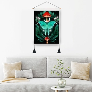 Hanging tapestry with moon moth and mushrooms, wooden rod and black tassels on white wall