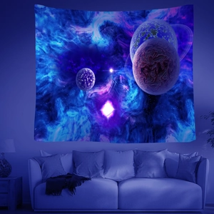Detailed texture of galaxy tapestry featuring purple nebula and planets on wall