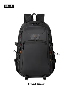 Detail of black outdoor backpack featuring orange stitching and durable side compression straps