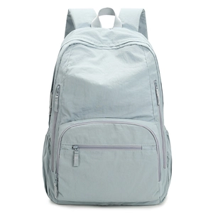 Lightweight light blue nylon outdoor backpack with multiple pockets and ergonomic straps