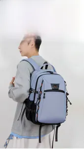 Detailed side view of light blue outdoor backpack on a person for travel and daily use
