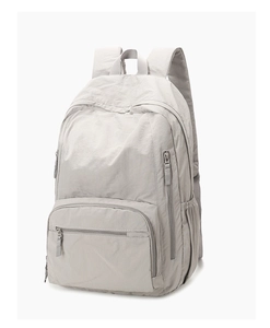 Lightweight grey nylon outdoor backpack featuring a spacious main compartment and side pockets
