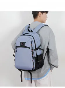 Side view of a light blue outdoor backpack with durable fabric and adjustable straps