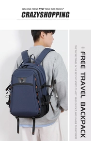 Detail of navy blue travel backpack showing side compression buckles and metal D-rings