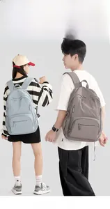 Outdoor nylon backpack showing large capacity and side pockets for water bottles