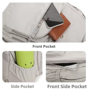 Detail view of nylon backpack featuring front zipper pockets and elastic side water bottle pouches