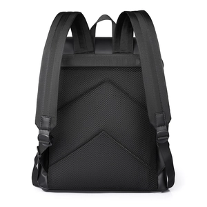 Minimalist black backpack with breathable honeycomb mesh back and padded shoulder straps