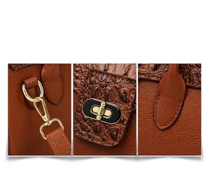 Details aus braunem Krokodilleder mit goldener Hardware und hochwertiger Verarbeitungen