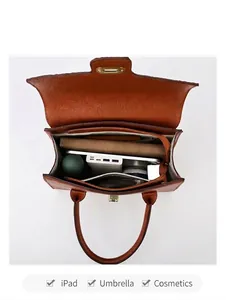 Draufsicht auf das große Innenfach der braunen Ledertasche mit Platz für iPad und Utensilien