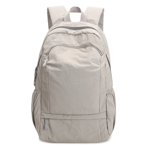 Light grey foldable waterproof travel backpack with large capacity and front zip pocket