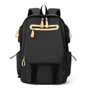Matte black high-capacity commuter backpack with contrasting beige trim for travel