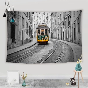 American subway style wall tapestry featuring a yellow streetcar in monochrome city scenery