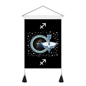 Detail of Sagittarius constellation tapestry with wooden hanging rod and black tassels