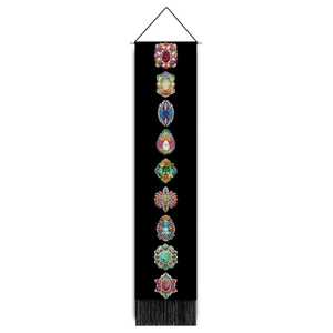 Black bohemian wall tapestry featuring nine vintage jewel patterns with bottom tassels