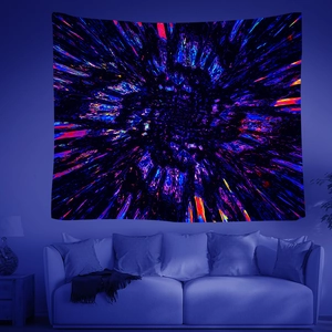 Detail of UV reactive tapestry showing glowing purple nebula and spiral galaxy on wall