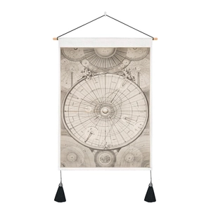 Close-up of vintage astronomical star map tapestry with black tassels and hanging wood