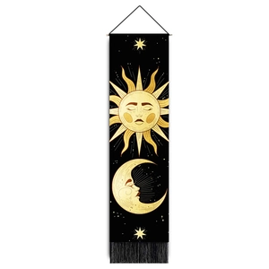 Detail of bohemian black sun and moon tapestry with gold stars and hanging fringe