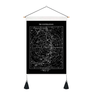Vintage celestial constellations wall tapestry with black background and wooden hanging rod