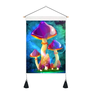 Detail of psychedelic mushroom tapestry with colorful patterns and black tassels