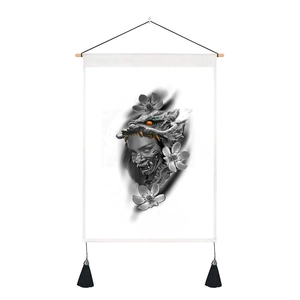 Close-up of Japanese tattoo art scroll with wood hanger and black tassel detail