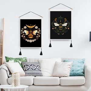 Set of 2 bee and flower wall art with black background and wooden hanging frame