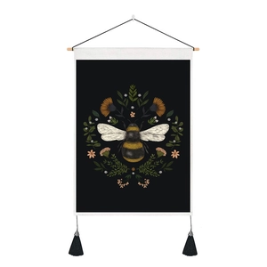 Detail of vintage wall tapestry showing a realistic honeybee with floral circular frame