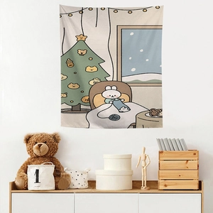 Detail of cozy wall tapestry featuring a rabbit knitting and Christmas tree scene