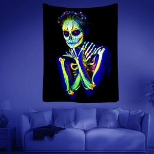Detail of UV reactive skull tapestry with vibrant fluorescent mushroom art for wall decor