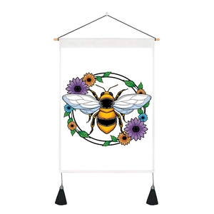 Detail of floral bee print tapestry with wooden rod and black hanging tassels decoration