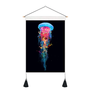 Detail of hanging tapestry showing 3D digital fluorescent jellyfish on black canvas texture