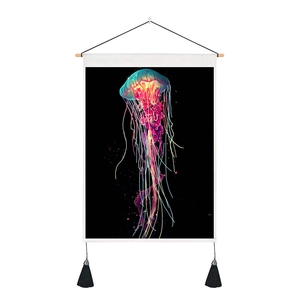Detail of neon jellyfish wall tapestry with black fringe and wooden hanging rod