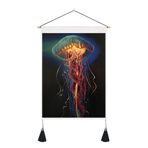 Close-up of 3D jellyfish tapestry showing fabric texture, wooden pole, and black tassels