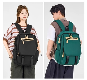 Detail view of large capacity nylon backpack with adjustable buckles and functional pockets