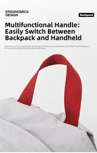 Close-up of reinforced wide carry handle with ergonomic red webbing on travel backpack