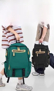 Detail of waterproof nylon backpack with reinforced dual handles and multiple zipper pockets
