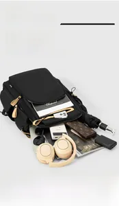 Detail of multi-compartment interior with organized pockets for electronics and accessories