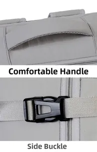 Detail of light grey backpack featuring a padded handle and durable side release buckles