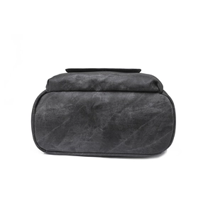 Detailed bottom view of vintage PU leather backpack showing durable stitching and oval base