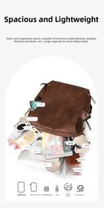 Spacious faux leather backpack showing organized storage for 14-inch laptop and essentials