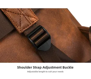 Close-up of brown PU leather bag with reinforced cross-stitching and adjustable strap buckle