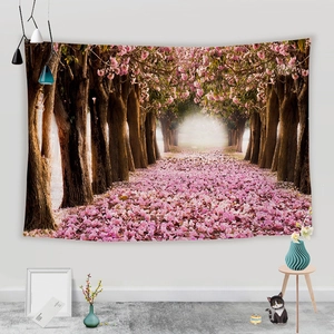 Detail view of Japanese cherry blossom wall tapestry in a cozy home interior setting