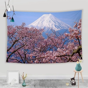 Detail of Mt. Fuji and cherry blossom tapestry on white wall in modern living room