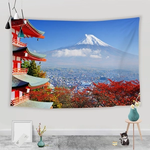 Detail of Fuji mountain and red pagoda tapestry hanging in a cozy home decor setting