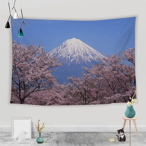 Detailed view of Mt. Fuji and cherry blossoms wall tapestry in a minimalist room