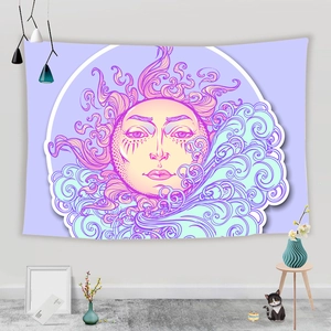 Close-up of macaron color sun and clouds pattern on a printed bedroom tapestry