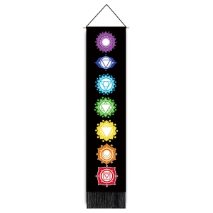 Detailed vertical black tapestry with seven chakra symbols, wooden rod and tassels
