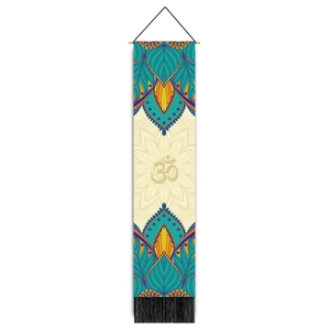 Detailed view of bohemian mandala wall tapestry with Om symbol and black tassel fringe