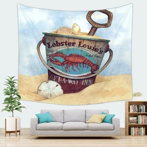 Detail of nautical tapestry with lobster illustration hanging over a modern sofa